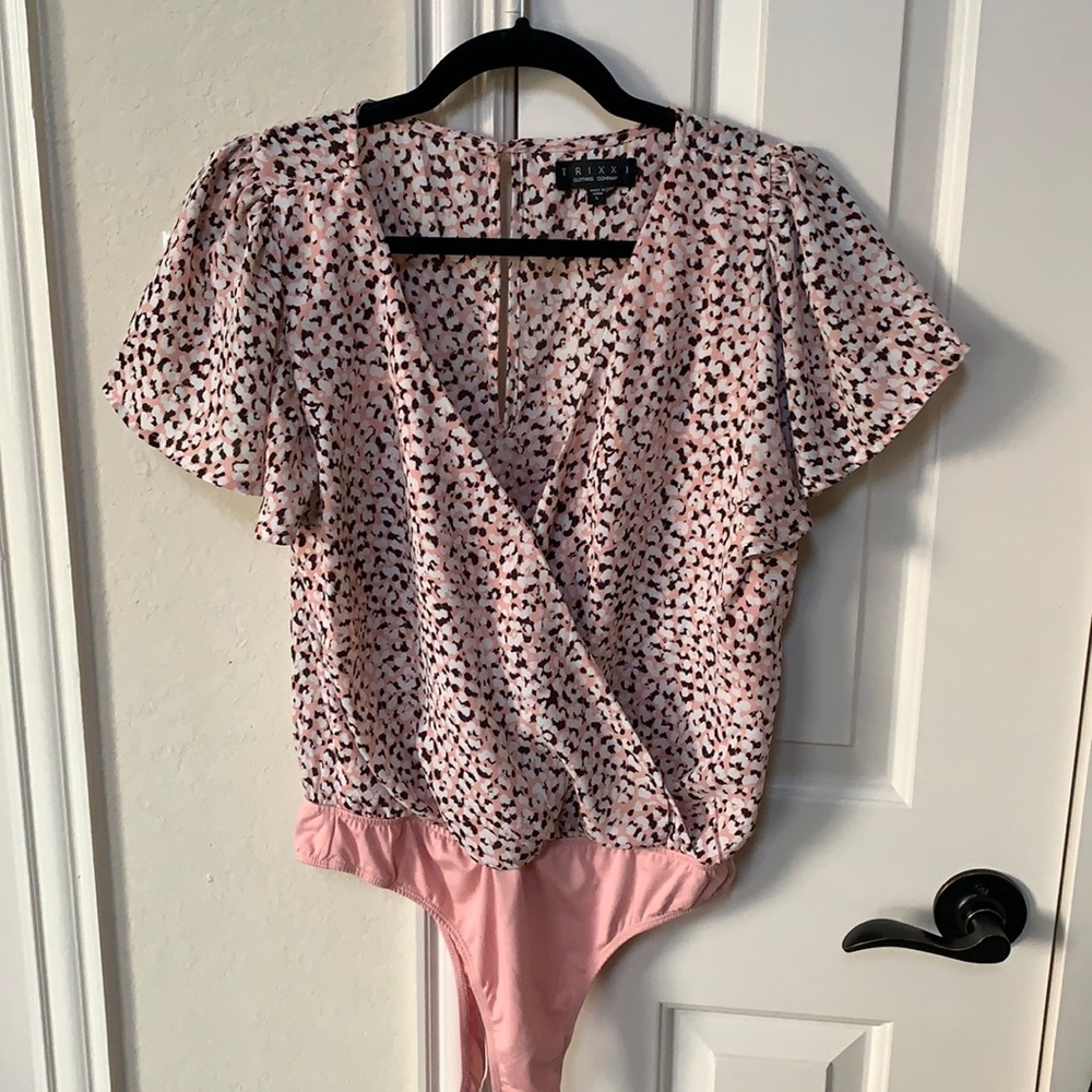 Trixxi clothing company body suit. Size large but fits like a medium.
